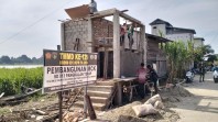 Kejar Target Penutupan TMMD ke-129, Satgas Kodim 0313/KPR Kebut Pembangunan MCK SD 013 Pangkalan Terap