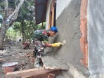 Bangga Menjadi Bagian Satgas TMMD, Sertu Ramadhan Curahkan Pengabdian Membangun Rumah Layak Huni untuk Warga   Pidie  Membangun Desa (TMMD) Ke-129 Kodim 0102/Pidie