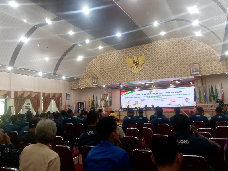 Bupati Afrizal Sintong Hadir Pelantikan Korcam KONI
